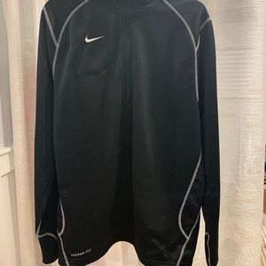 A black nike zip up